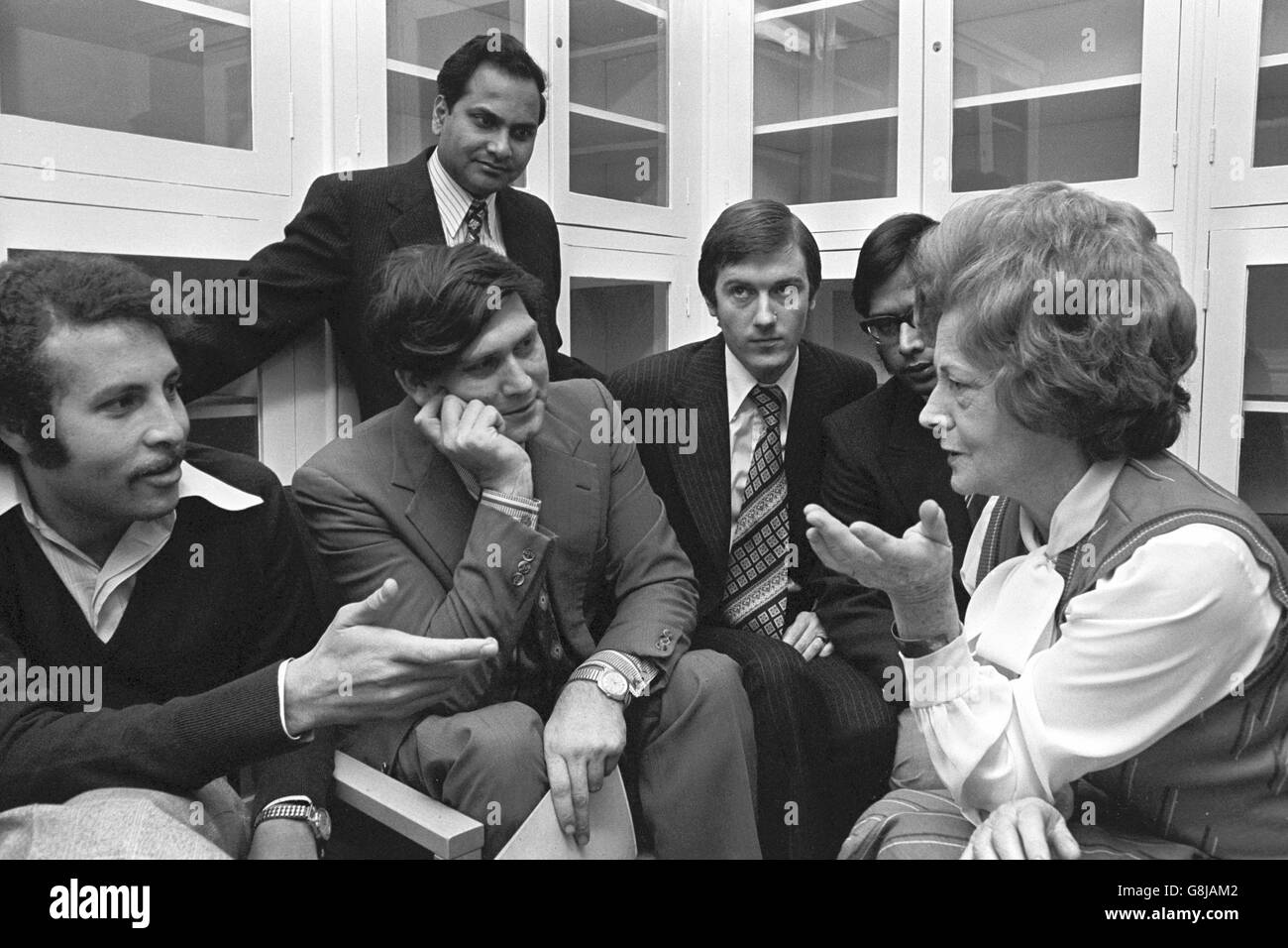 Social Services Secretary Barbara Castle talks with junior doctors at Blackburn Royal Infirmary. Australian Dr Wasily Sakalo, 31, chairman of the North-West Junior Staffs Committee, walked out of the meeting over pay calling it 'a waste of bloody time.' Stock Photo