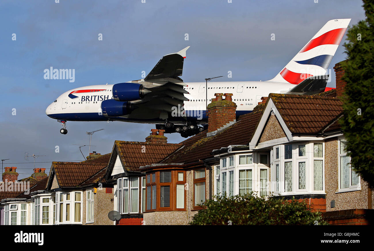 A British Airways Airbus A380 plane lands over houses in Myrtle Avenue near Heathrow Airport