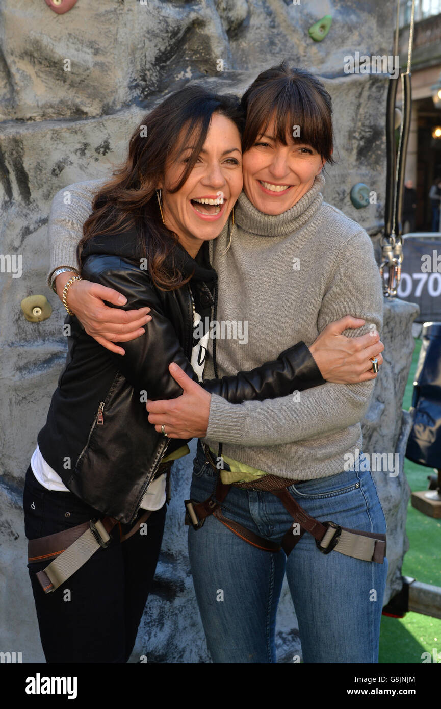 Julia Bradbury (left) and Davina McCall at a climbing wall in Covent Garden, London, to kick off the Duke of Edinburgh's Award Diamond Challenge. PRESS ASSOCIATION Photo. Picture date: Tuesday, 12 January 2016. Photo credit should read: Matt Crossick/PA Wire. Over the course of the day visitors will climb the height of Ben Nevis on the climbing wall - to mark the 60th anniversary of the charity. Stock Photo