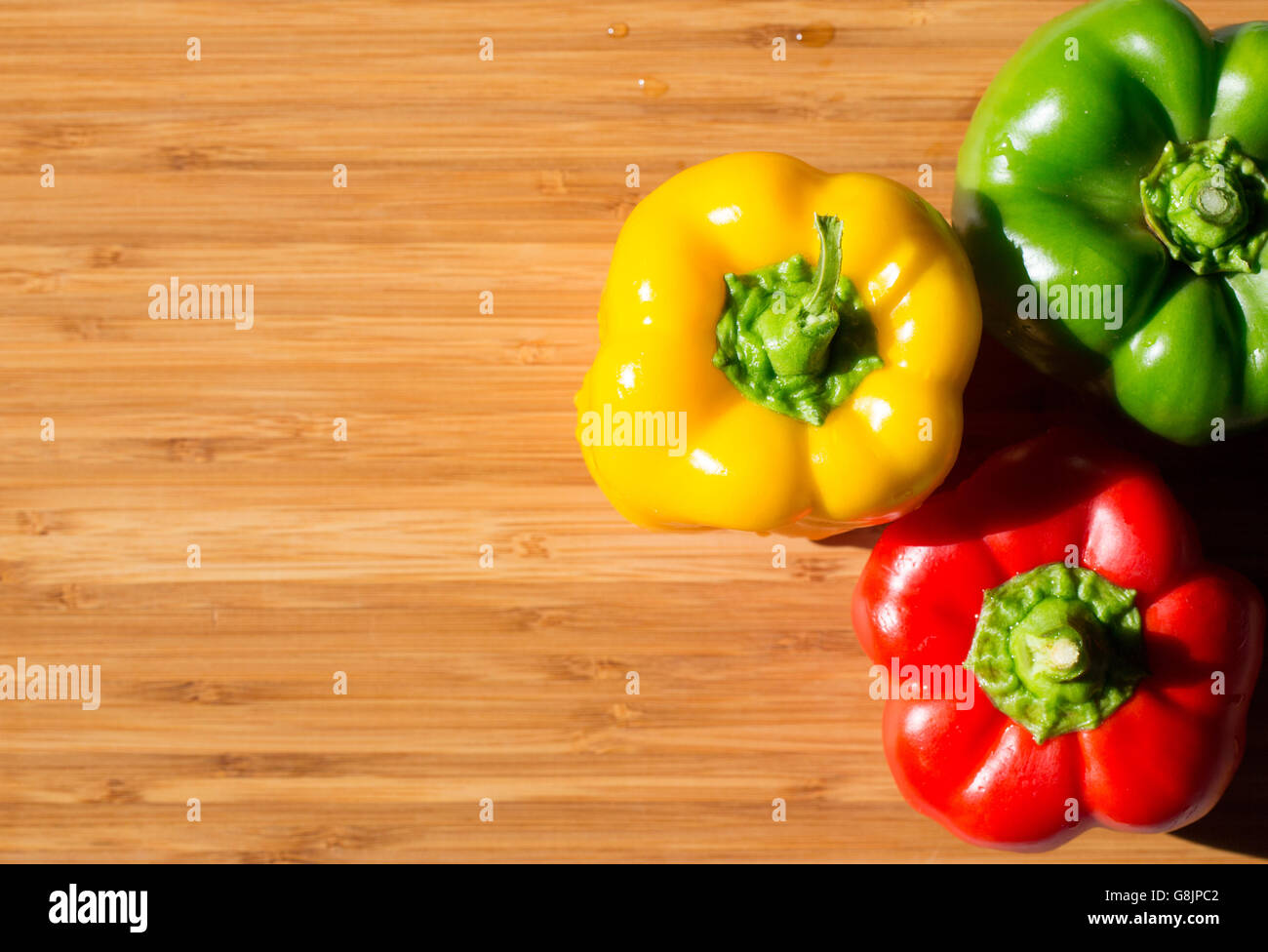 Green , yellow and red bell pepper background Stock Photo - Alamy