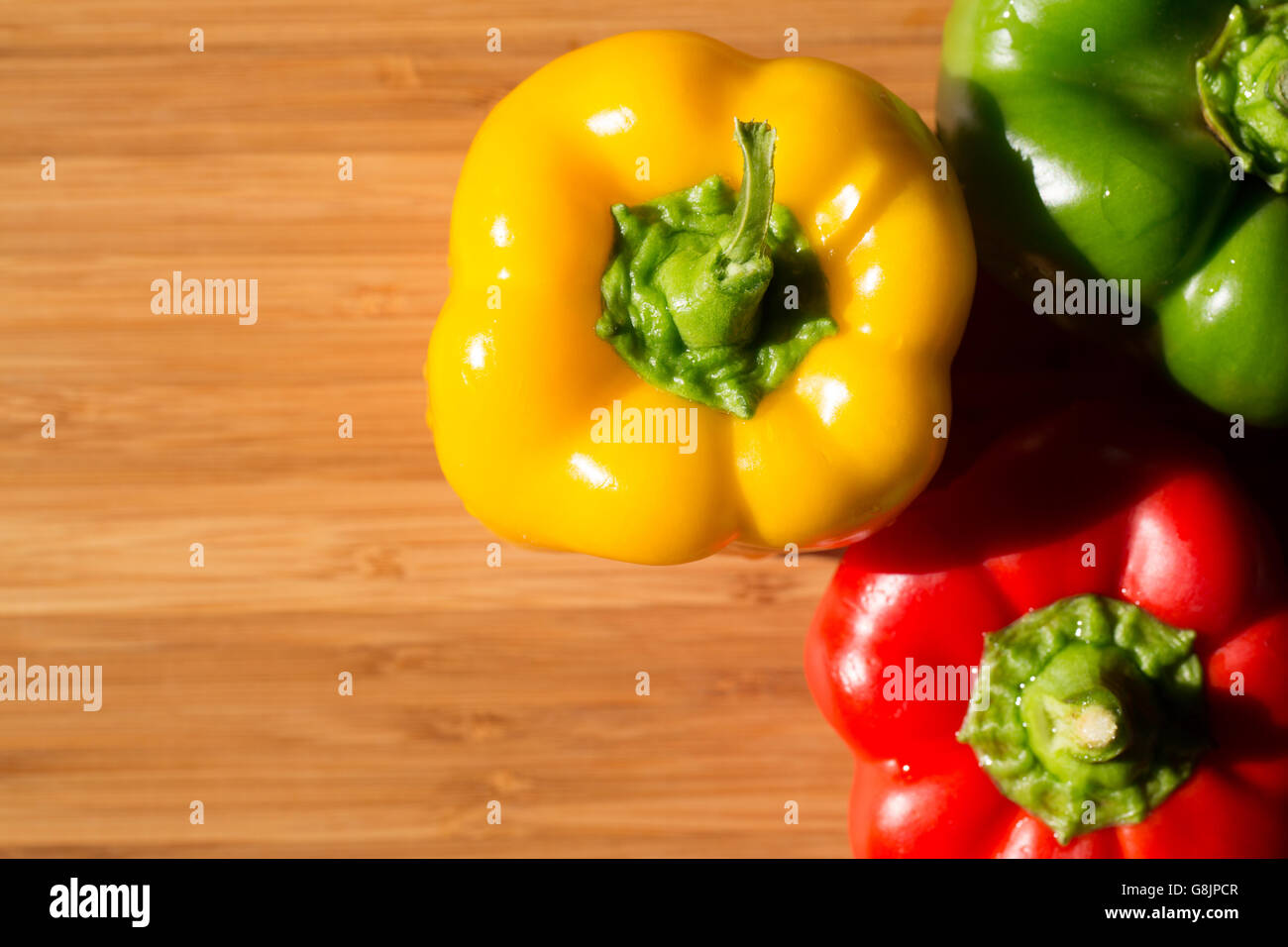 Green , yellow and red bell pepper background Stock Photo - Alamy