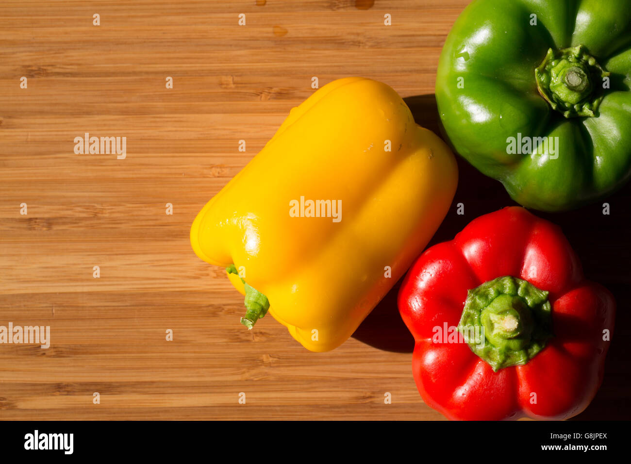 Green , yellow and red bell pepper background Stock Photo - Alamy