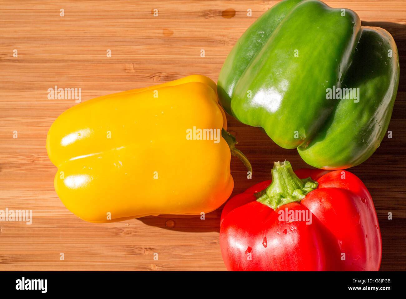 Green , yellow and red bell pepper background Stock Photo - Alamy