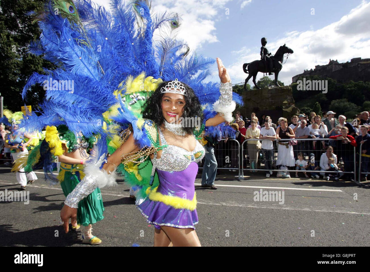 A dancer with the Edinburgh Samba School at the start of Edinburgh Festivals' Cavalcade 2005. The world's biggest arts festival is to open today with a large parade in the Scottish capital. Stock Photo