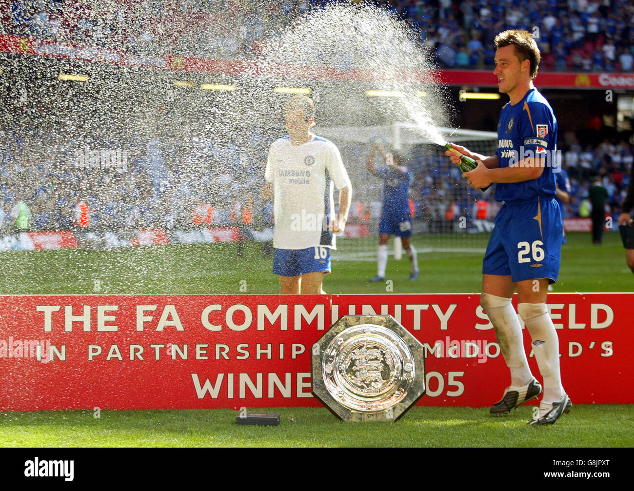 Chelsea's John Terry celebrates winning the FA Community Shield by spraying champagne Stock Photo