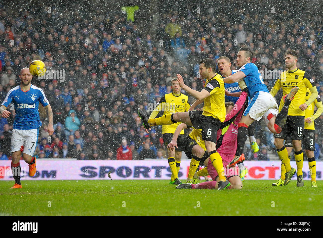 Rangers' Danny Wilson (right) scores their first goal of the game during the Ladbrokes Scottish Championship match at Ibrox, Glasgow. Stock Photo