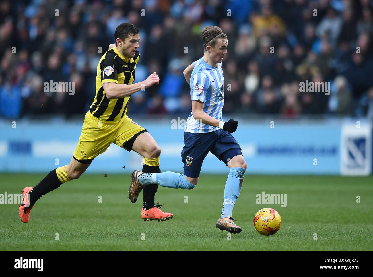 Coventry City v Burton Albion - Sky Bet League One - Ricoh Arena. s James  Maddison is challenged by Burton Albion's John Mousinho Stock Photo - Alamy