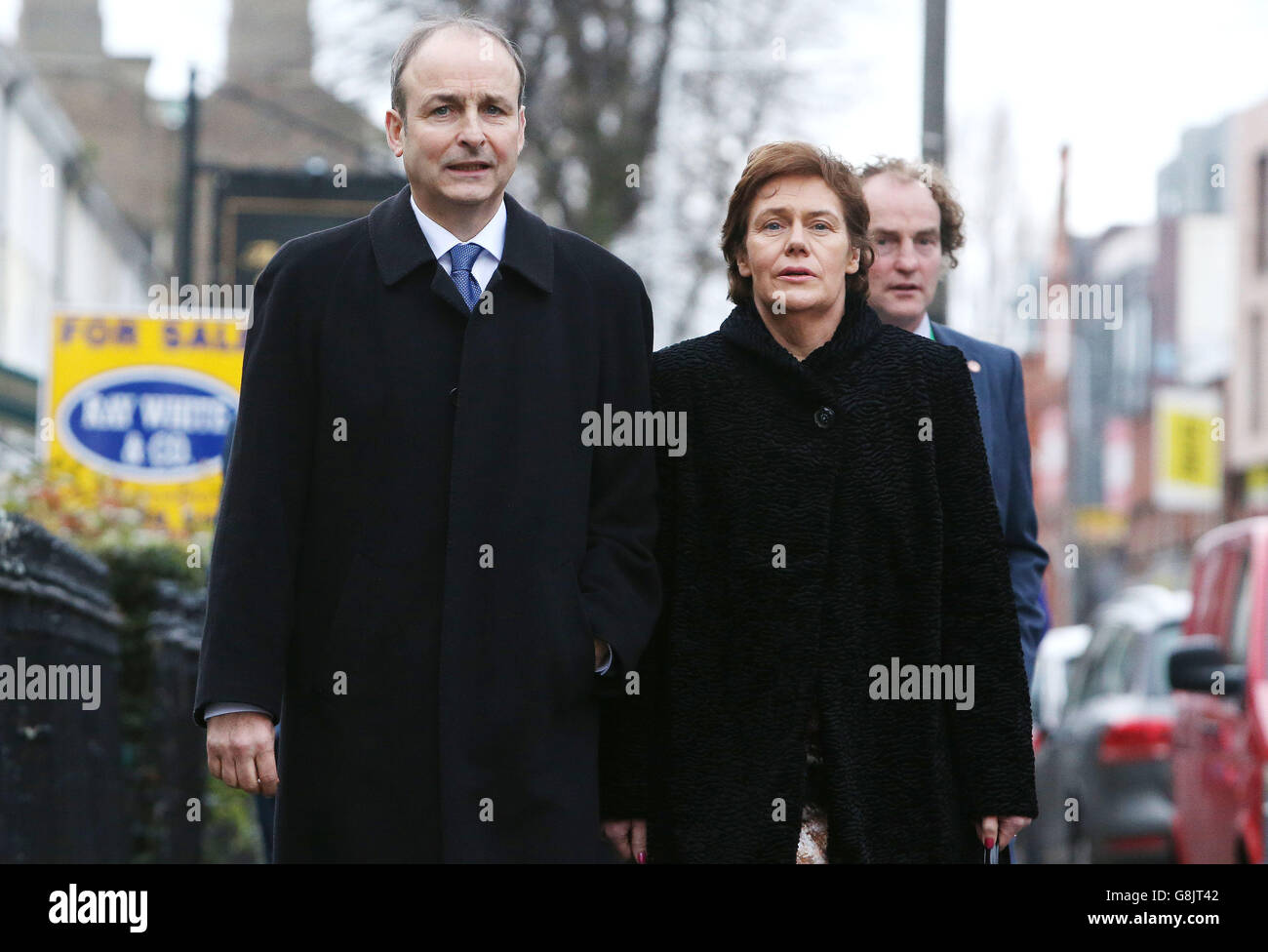 l Martin and his wife Mary arrive for the funeral of former spin doctor and political strategist PJ Mara at St. Mary's Church, Haddington Road, Dublin. Stock Photo