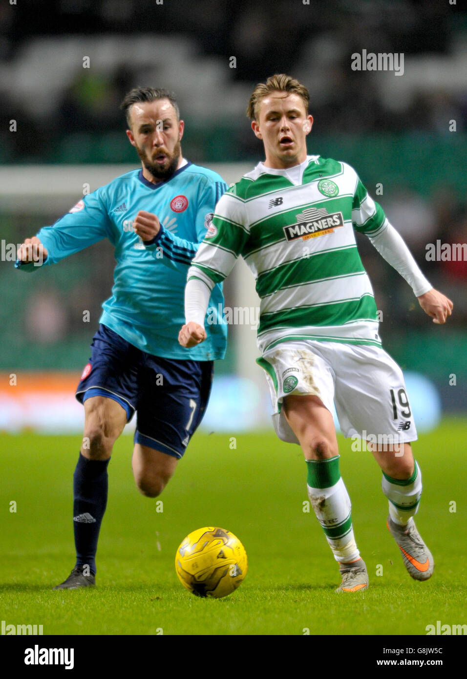 Celtic's Scott Allan and Hamilton Academical's Dougie Imrie battle for the ball during the Ladbrokes Scottish Premiership at Celtic Park, Glasgow. Stock Photo