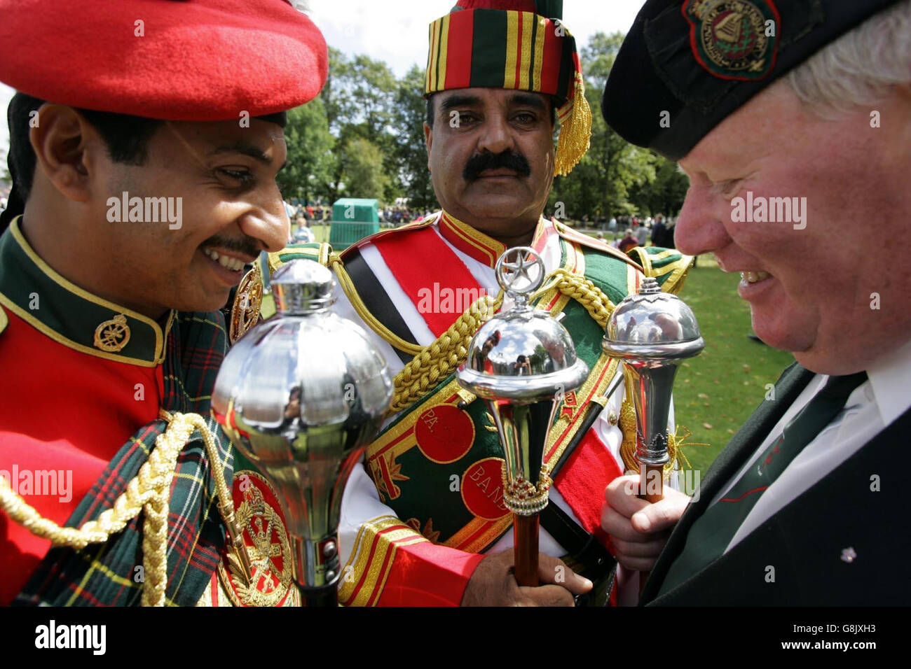 (LR) Drum Majors Saif Nasser from the Royal Army of Oman Pipe Band