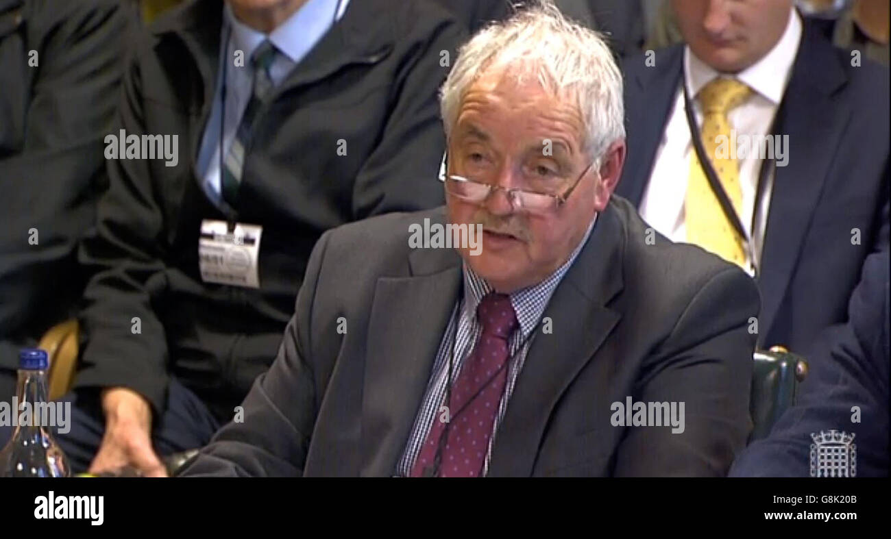 Keith Little, Cabinet Member for Highways, Transport and Flood Protection, Cumbria County Council, gives evidence to the Environment, Food and Rural Affairs Committee in the Palace of Westminster, London, on recent flooding which swamped around 16,000 homes in England. Stock Photo