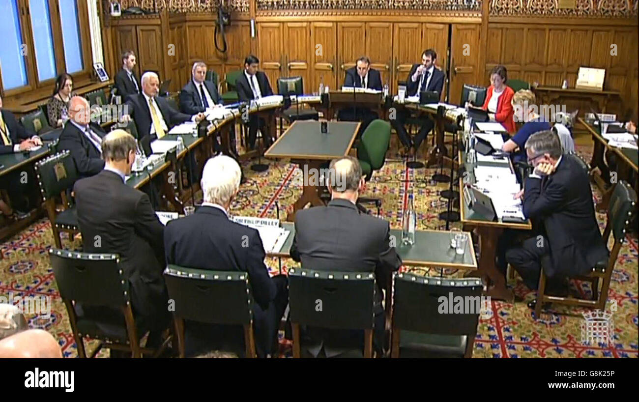 (From the right) Sir James Bevan, Environment Agency Chief Executive Officer, Sir Philip Dilley, Environment Agency Chairman and David Rooke, Environment Agency Deputy Chief Executive, give evidence to the Environment, Food and Rural Affairs Committee in the Palace of Westminster, London, on recent flooding which swamped around 16,000 homes in England. Stock Photo