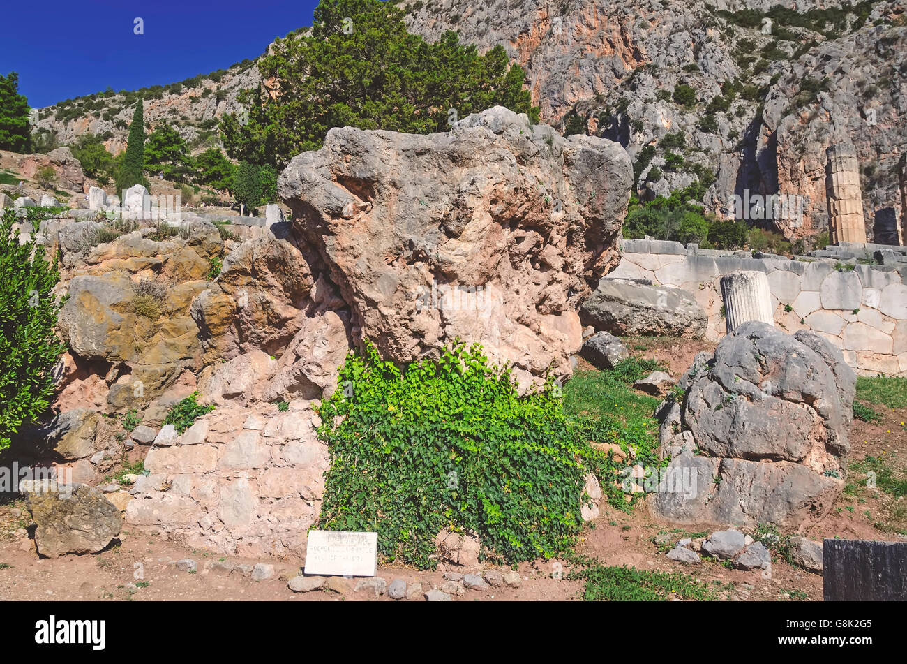 Rock of the Sybil below the Temple of Apollo, Archaeological Site of Delphi Greece, Stock Photo