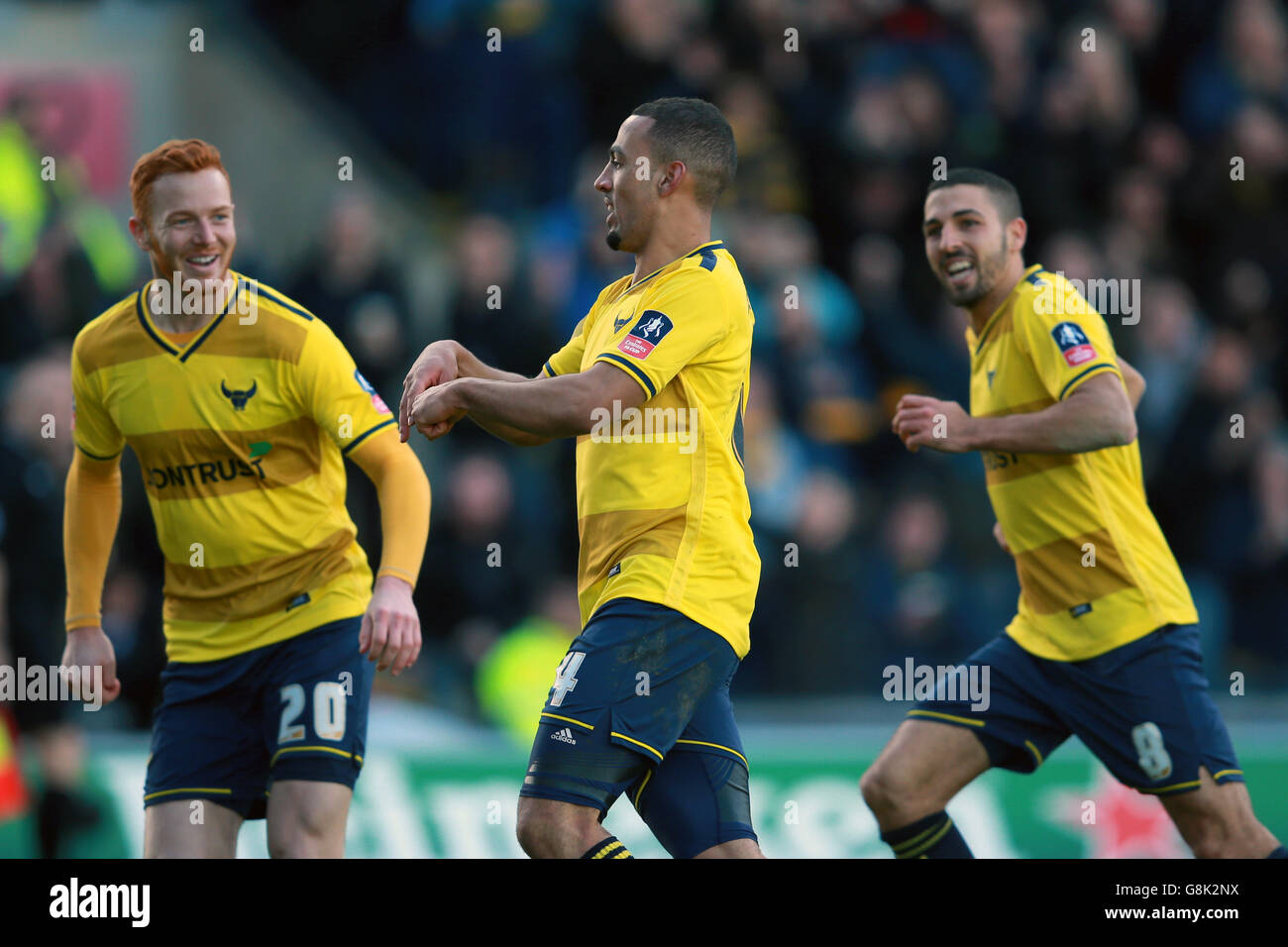 Oxford United's Kemar Roofe celebrates scoring his side's third goal during the Emirates FA Cup, third round match at the Kassam Stadium, Oxford. Stock Photo