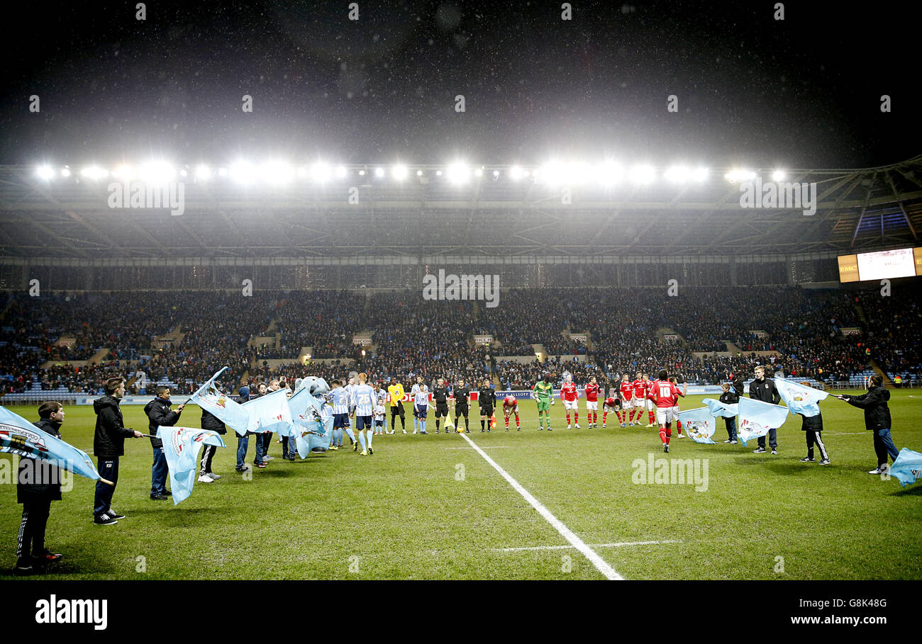 Coventry City and Walsall observe a minutes silence before the game Stock Photo