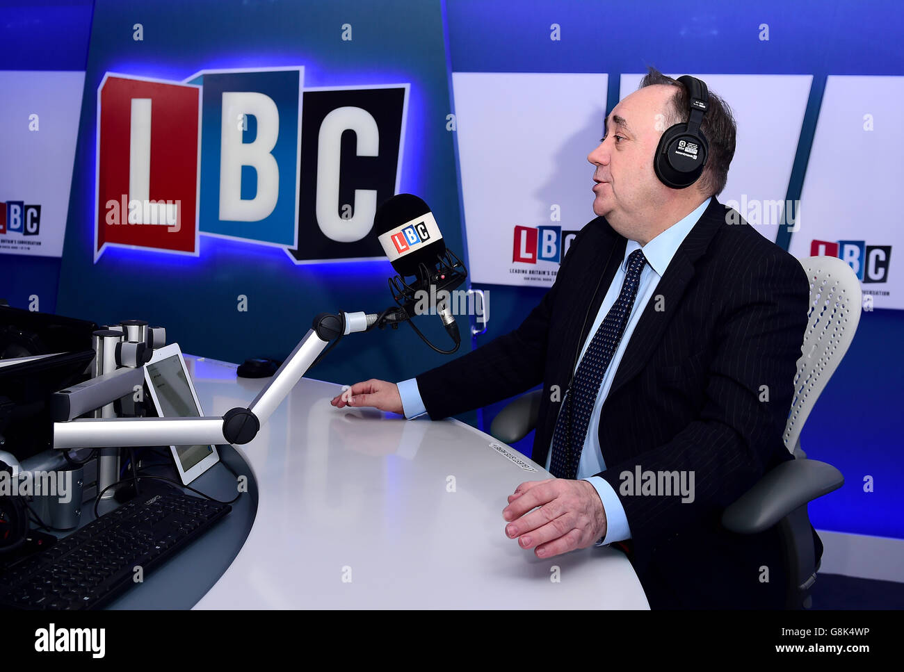Alex Salmond takes part in his first live weekly phone-in on the national  news talk radio station LBC, hosted by presenter Iain Dale at Global Radio  in London Stock Photo - Alamy