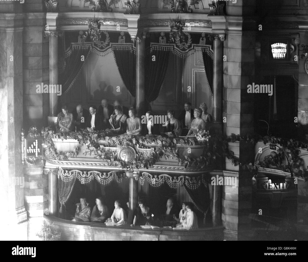 King George V and Queen Mary attend the Royal performance at the London Coliseum. In addition to the King and Queen, the Royal party included Princess Mary and Viscount Lascelles, the Queen of Norway and Princess Victoria. Stock Photo