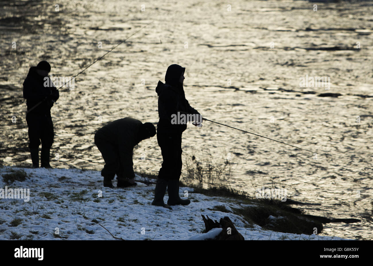 Anglers on the River Tay in Kenmore, Scotland, on the opening day of the salmon fishing season. Stock Photo