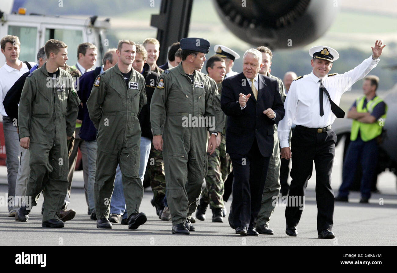 Royal Navy Commander Ian Riches (far right) with Armed forces minister ...