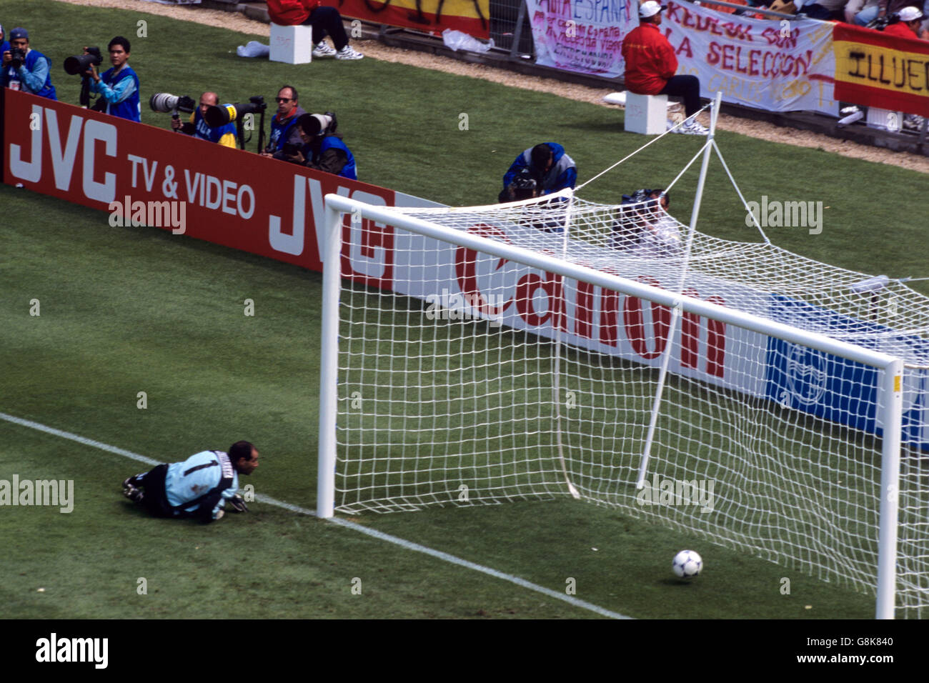 Spain goalkeeper Andoni Zubizarreta looks back as the ball rolls into the net after making a mistake on his near post to gift Nigeria their second goal Stock Photo