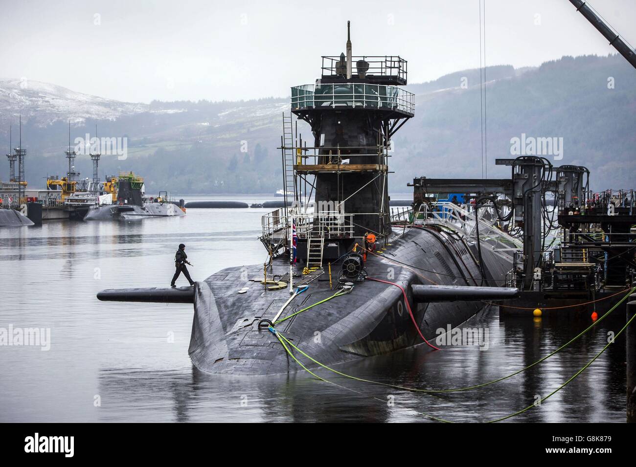 Vanguard-class submarine HMS Vigilant, one of the UK's four nuclear warhead-carrying submarines, at HM Naval Base Clyde, also known as Faslane, ahead of a visit by Defence Secretary Michael Fallon. Stock Photo