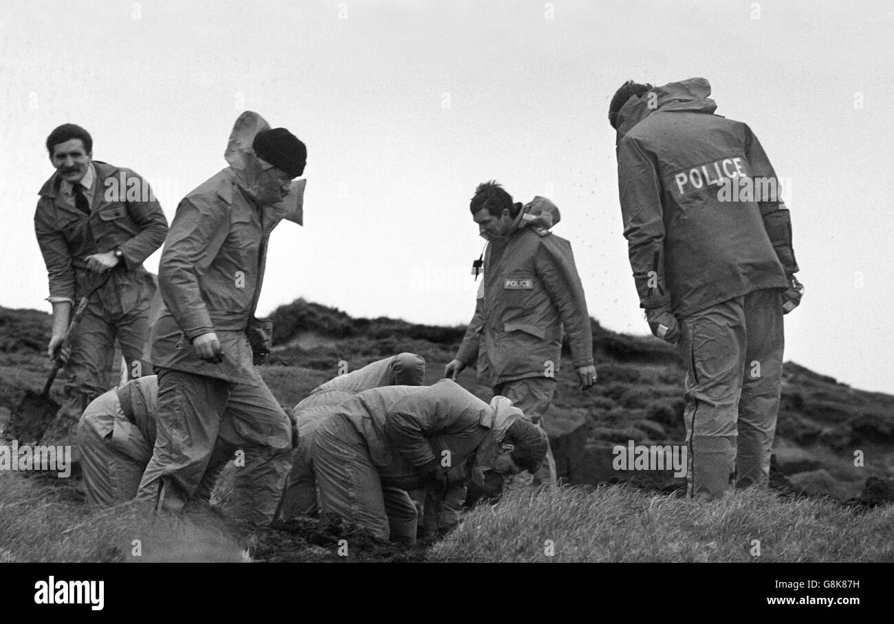Police dig at one of the spots indicated by specially trained sniffer dogs, on Saddleworth Moor, near Oldham. They are searching for the bodies of Pauline Reade, 16, and Keith Bennett, 12, who disappeared at the time of the Moors murders more than 20 years ago. Stock Photo