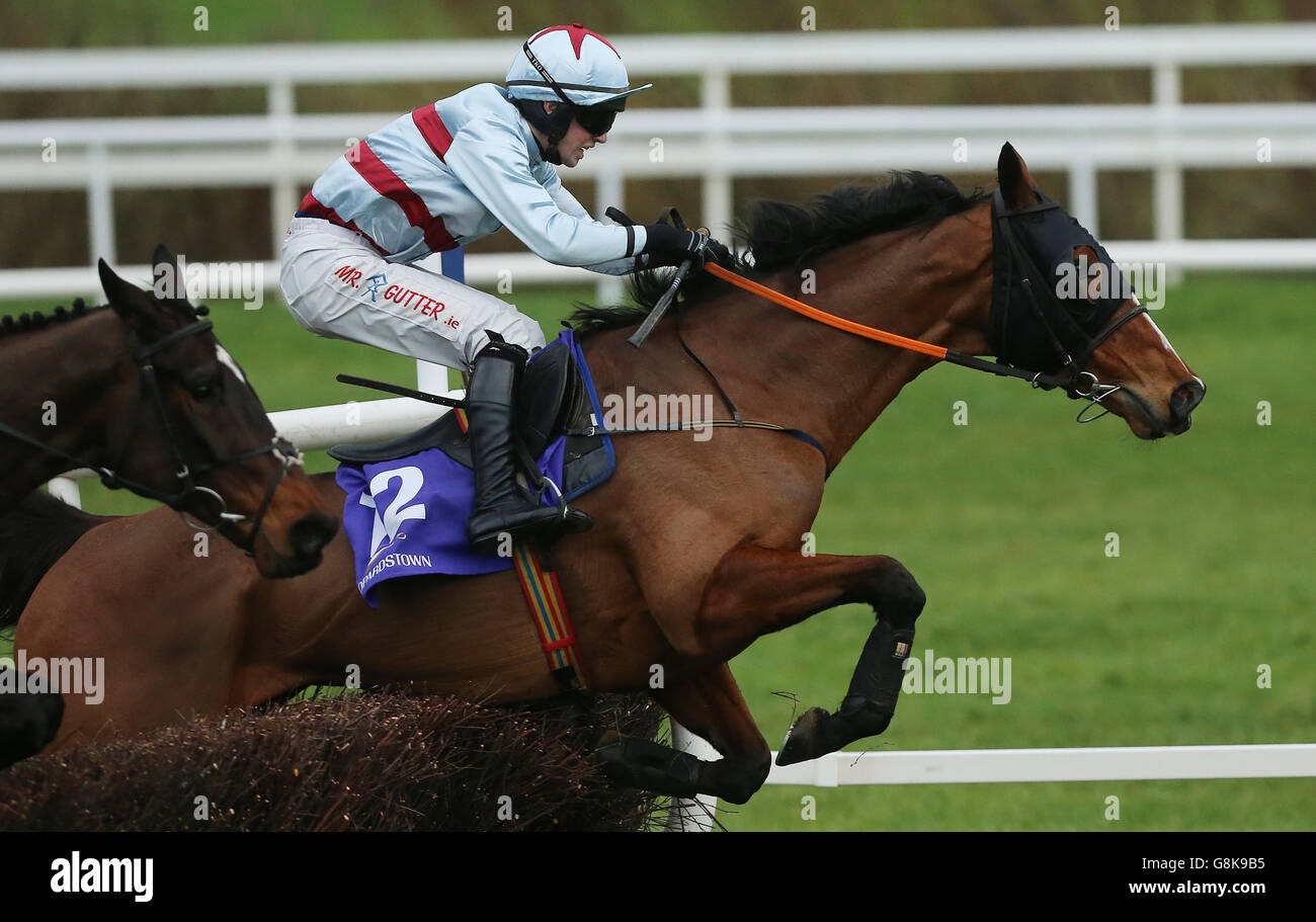 The Mooch ridden by Jonathan Moore jumps the last to win The Sandyford Handicap Chase during the BHP Insurances Irish Champion Hurdle day at Leopardstown Racecouse, Dublin. Stock Photo