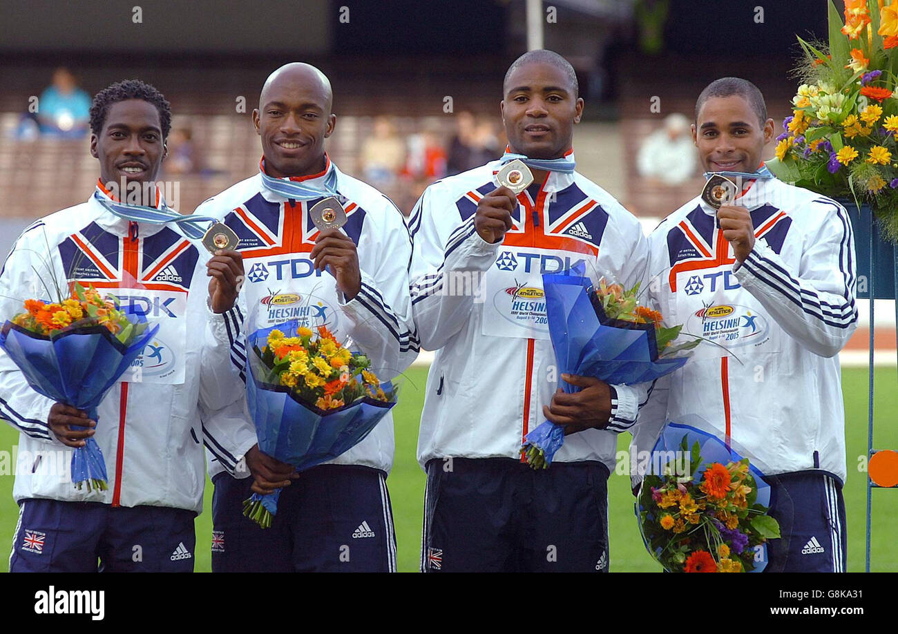 Athletics - IAAF World Athletics Championships - Helsinki 2005 - Olympic Stadium. Great Britain's 4x100 relay team with their Bronze Medals. Stock Photo