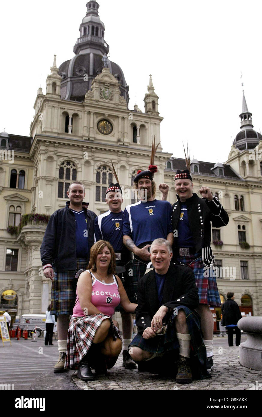 Scotland fans Davy Stouty (top right) with friends from Falkirk and Dundee, outside the Rathus (local govenment building), ahead of Scotland's friendly international match against Austria. Stock Photo