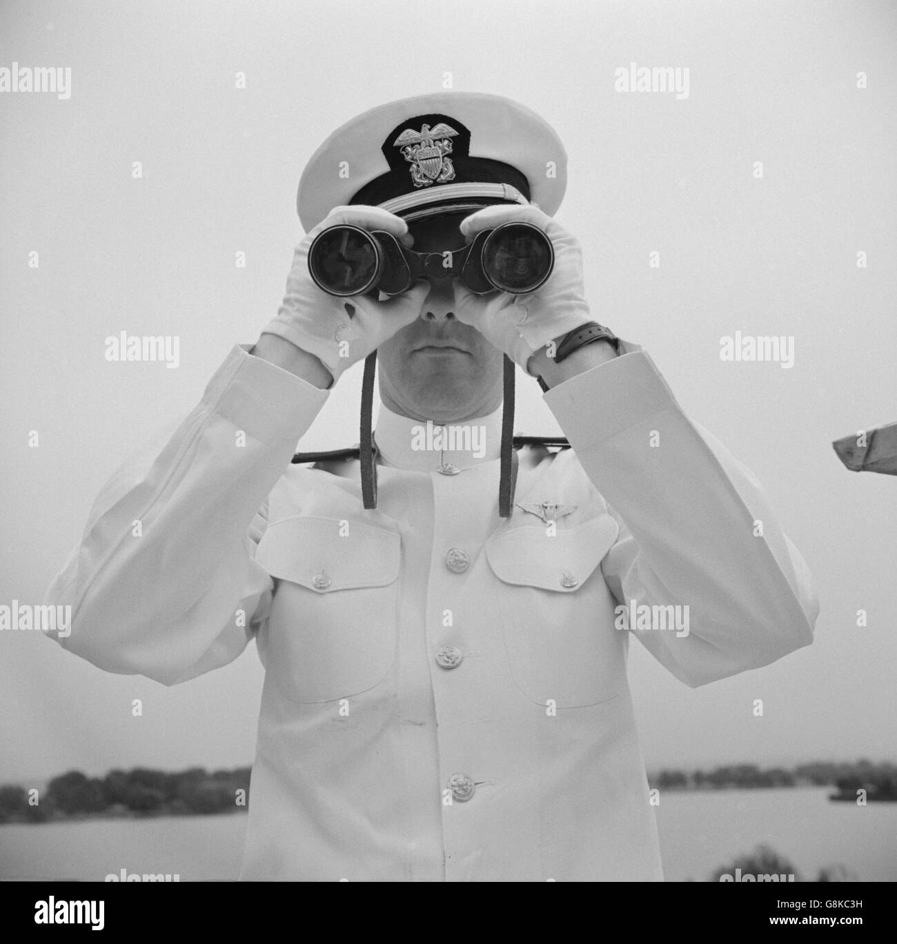 Naval Officer Looking Through Binoculars, Anacostia, Washington DC, USA, John Collier for Office of War Information, August 1941 Stock Photo