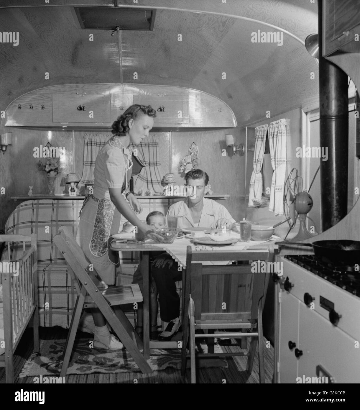 Family in Trailer Home at Glenn L. Martin Trailer Village, a Farm Security Administration (FSA) Housing Project, Middle River, Maryland, USA, John Collier for Office of War Information, August 1943 Stock Photo