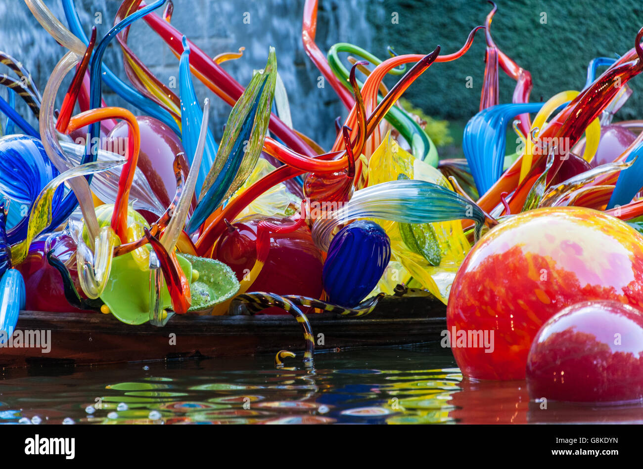 'Fiori Boat and Niijima Floats' glass sculpture by Dale Chihuly at Atlanta Botanical Garden's Chihuly in the Garden exhibit. Stock Photo