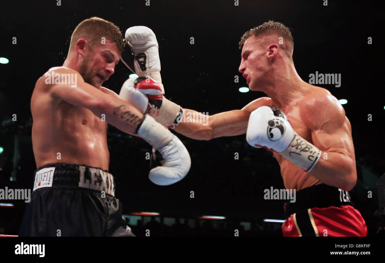 John Wayne Hibbert (left) and Tommy Martin during their Commonwealth and WBC International Super-Lightweight Championship bout at the Copper Box Arena, London. Stock Photo