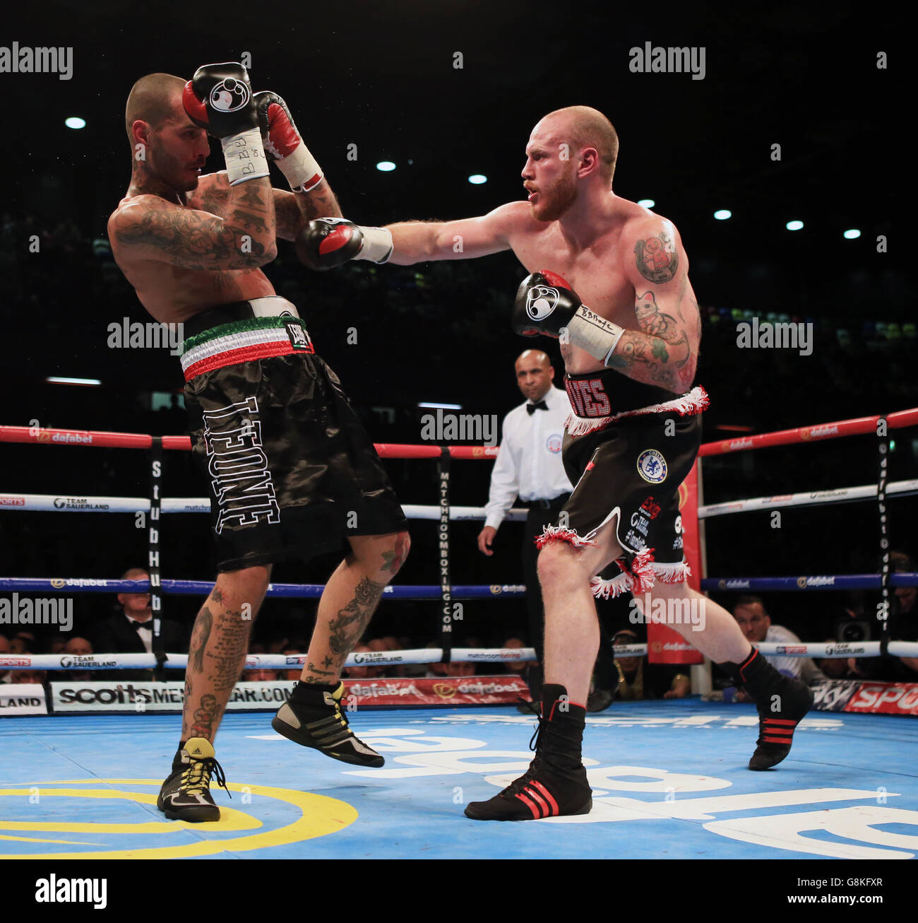 George Groves (right) and Andrea Di Luisa during their International Super-Middleweight contest at the Copper Box Arena, London. Stock Photo
