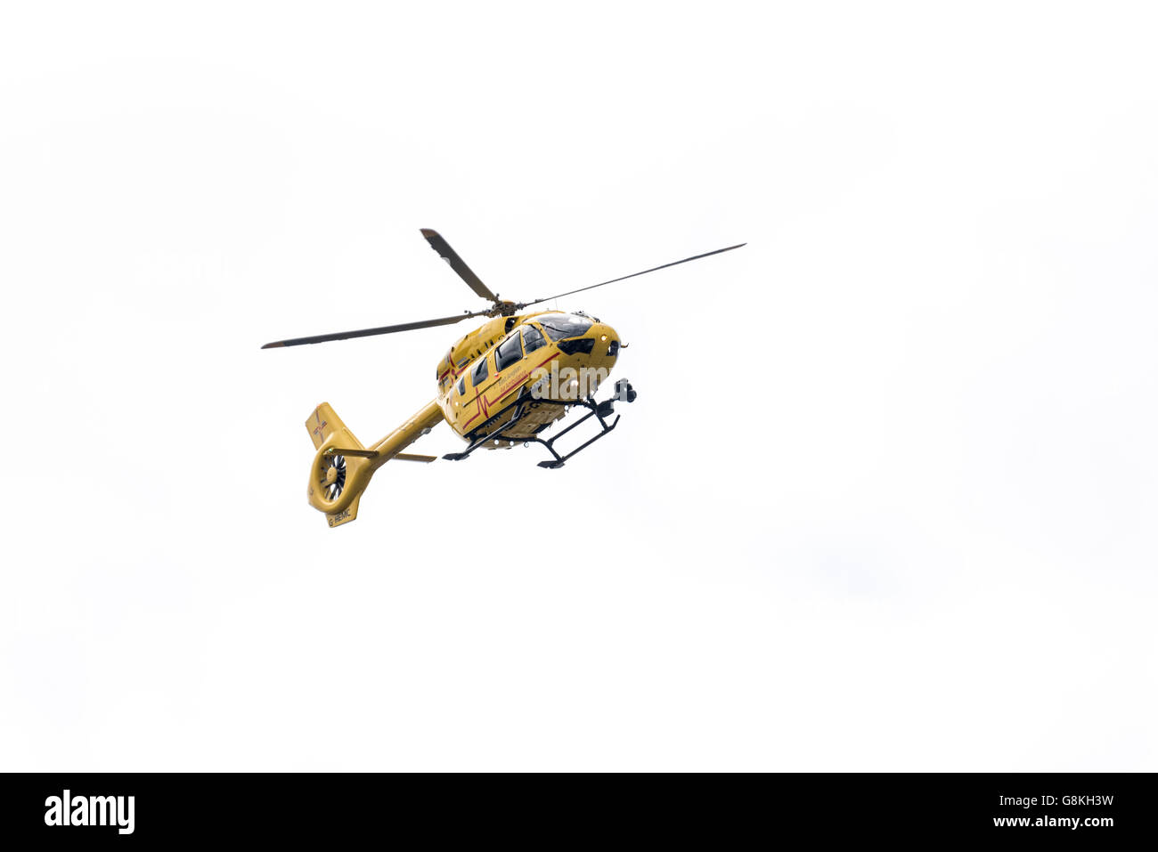 The East Anglian Air Ambulance flying Stock Photo