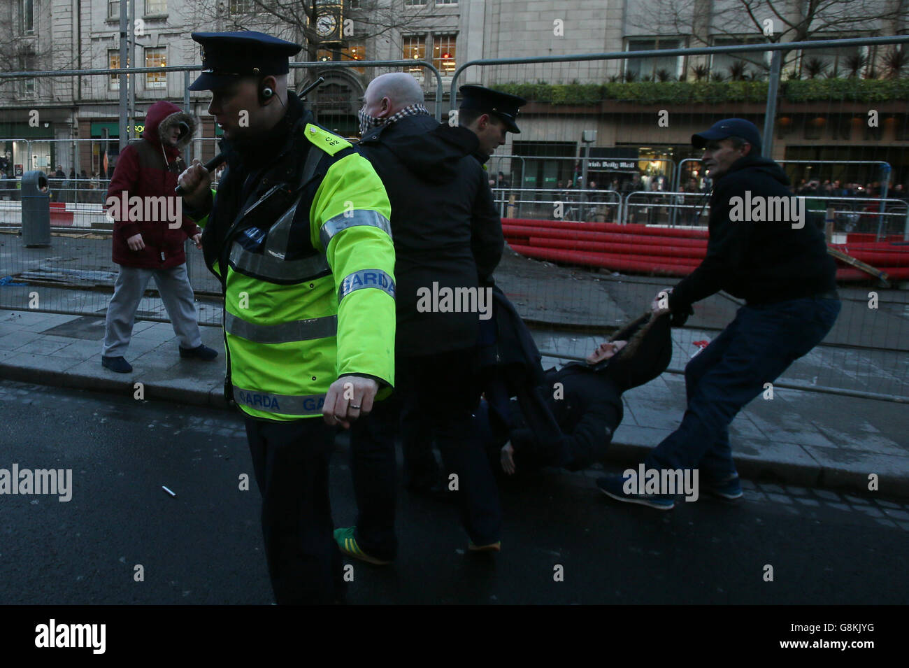 Gardai on O'Connell Street in Dublin during a counter demonstration against the launch of an Irish branch of Pegida, the far-right movement from Germany. Stock Photo