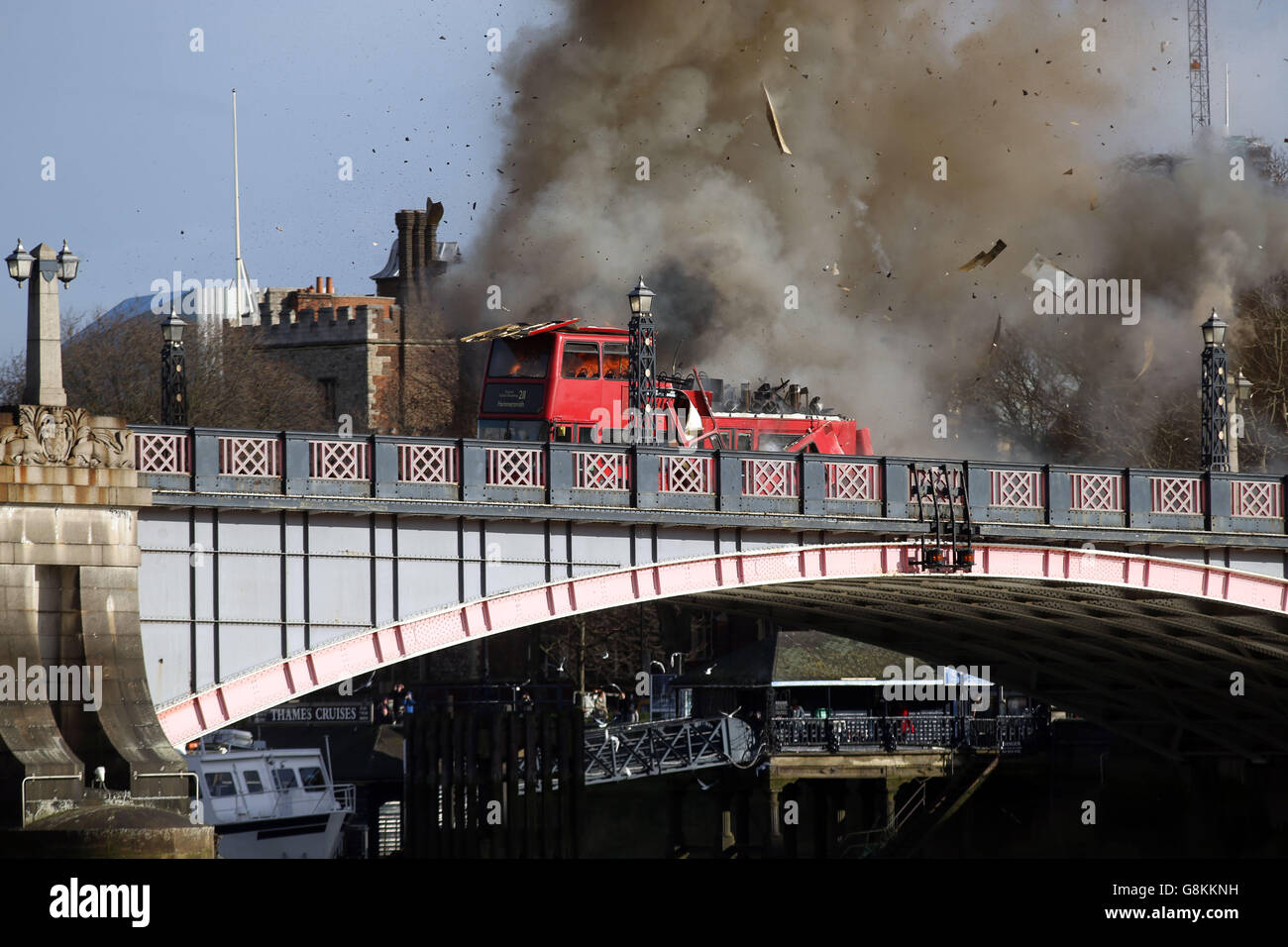 A bus explodes on Lambeth Bridge in London during filming for Jackie Chan's new film The Foreigner. Stock Photo