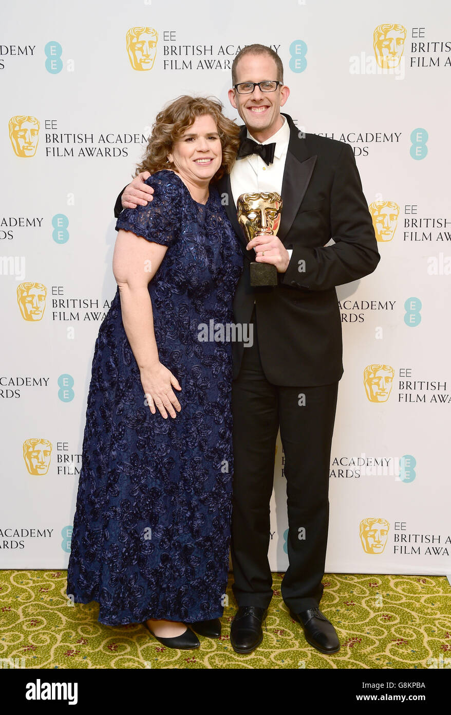 Pete Docter with the BAFTA for Best Animated Film (Inside Out) and Amanda Docter attends the after show party for the EE British Academy Film Awards at the Grosvenor House Hotel in Pete Docter with the BAFTA for Best Animated Film (Inside Out) and Amanda Docter attends the after show party for the EE British Academy Film Awards at the Grosvenor House Hotel in