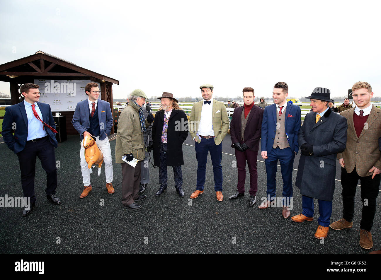The finalists in the best dressed male competition during the Gentlemen's and Kingmaker Chase Day at Warwick racecourse. Stock Photo