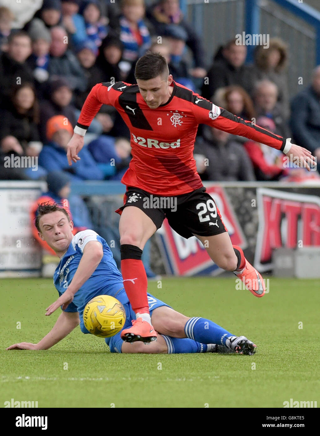 Queen of the South's Jordan Marshall and Rangers' Michael O'Halloran (right) for the ball during the Ladbrokes Scottish match at Palmerston Park, Dunfries Stock Photo - Alamy