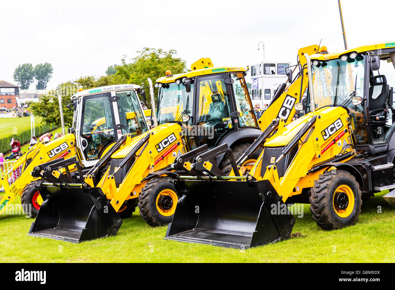 JCB digger diggers tractor tractors vehicles display at trade fare UK