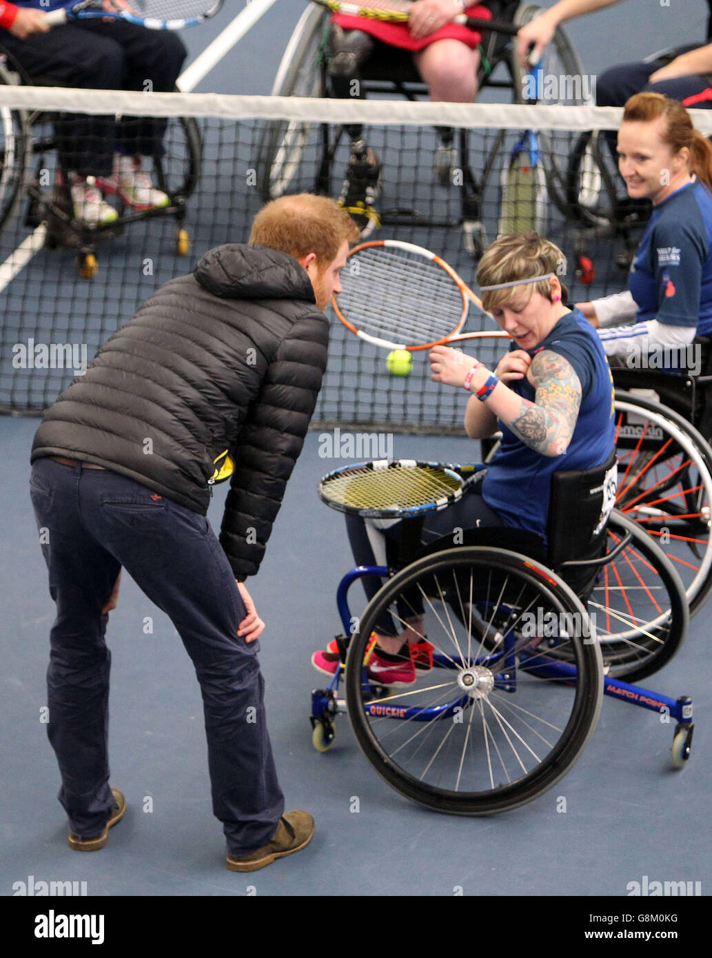 Prince Harry meets competitors as he attends the UK team trials for the