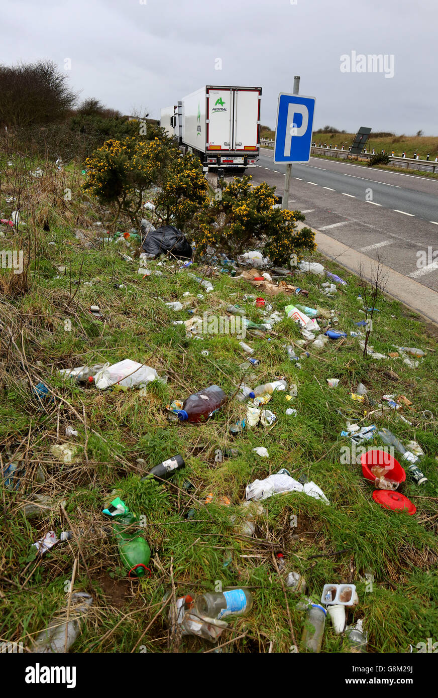 A view of the rubbish left by lorry drivers on the verge of the A20 near Dover in Kent as Kent Police's traffic officers continue a crackdown on lorry drivers parking illegally on slip roads and verges throughout the county. Stock Photo