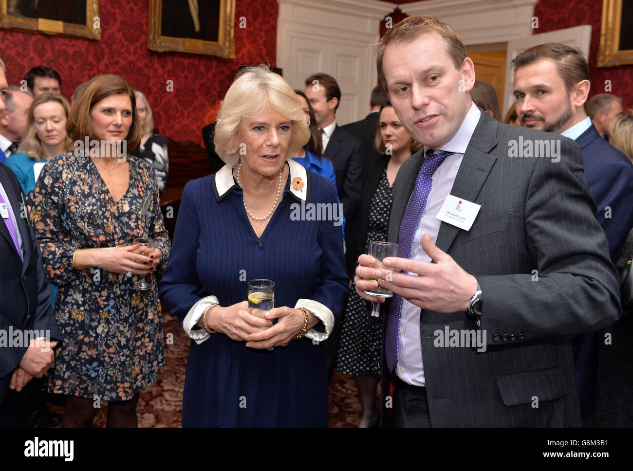 The Duchess of Cornwall speaks to guests as she attends a reception, in ...