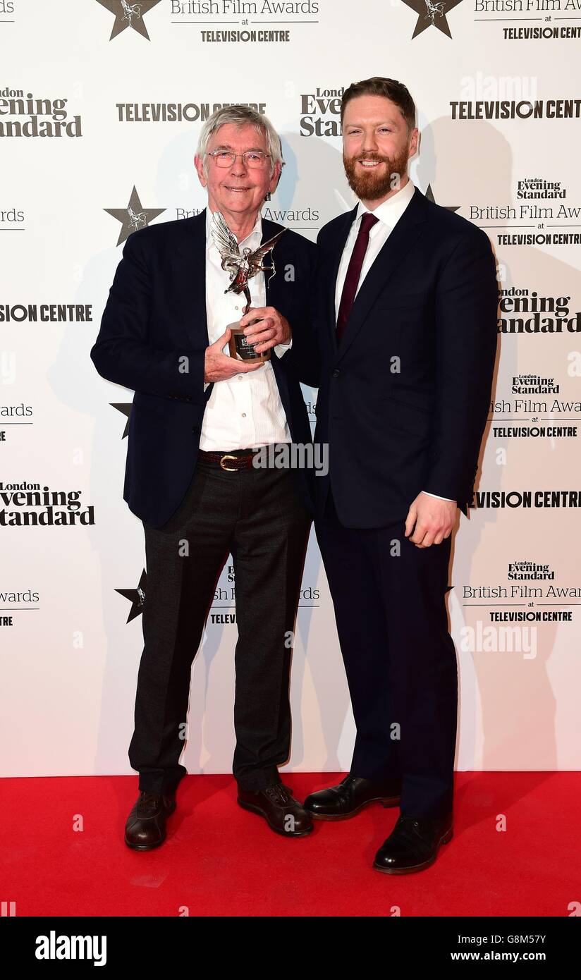 Sir Tom Tom Courtenay (left) and Tristan Goligher accept the Editors award for film 45 Years at the London Evening Standard British Film Awards at the Television Centre, White City, London. Stock Photo