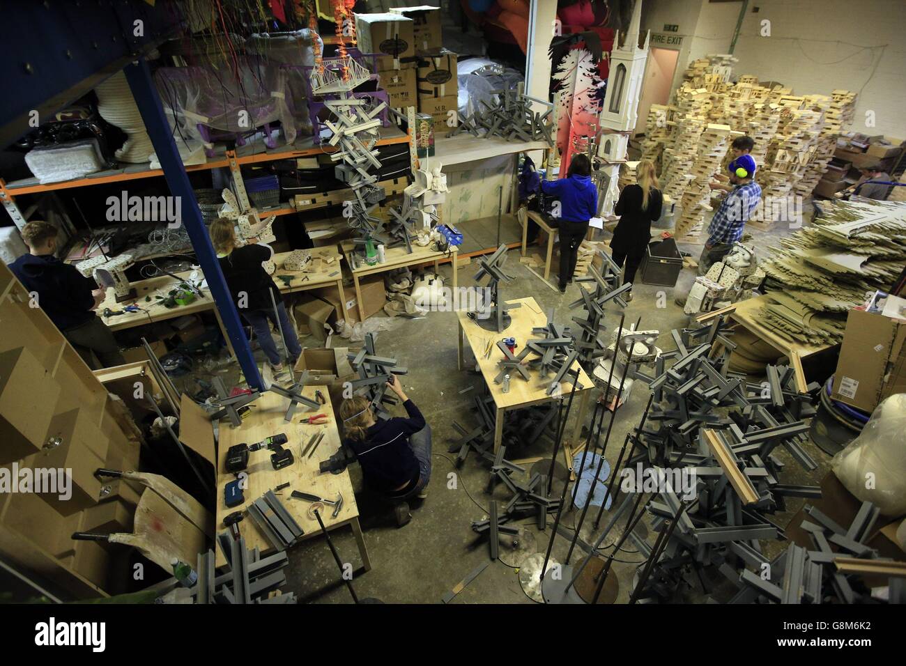 Members of the AD Events fabrication team build table centrepieces inspired by the films Carol, The Revenant, Bridge of Spies, The Big Short, and Spotlight, at their studio in Camberwell, London, for the dinner which will be held at The Grosvenor House after the EE BAFTA Film Awards. Stock Photo