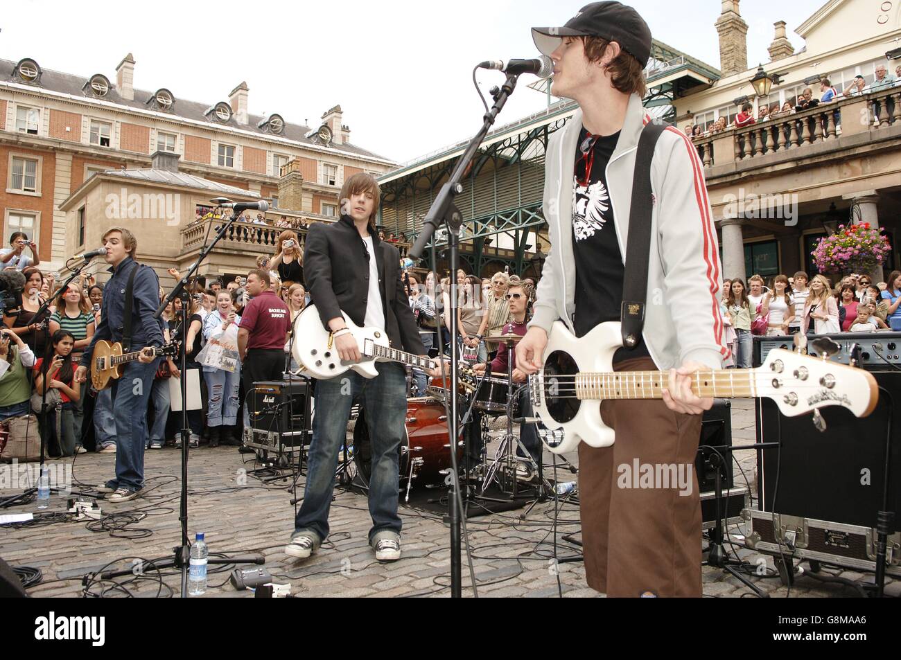 Pop band McFly busking in West Piazza Square in Covent Garden, central  London, today Monday 15 August 2005, in aid of the Teenage Cancer Trust.  PRESS ASSOCIATION Photo. Photo credit should read: