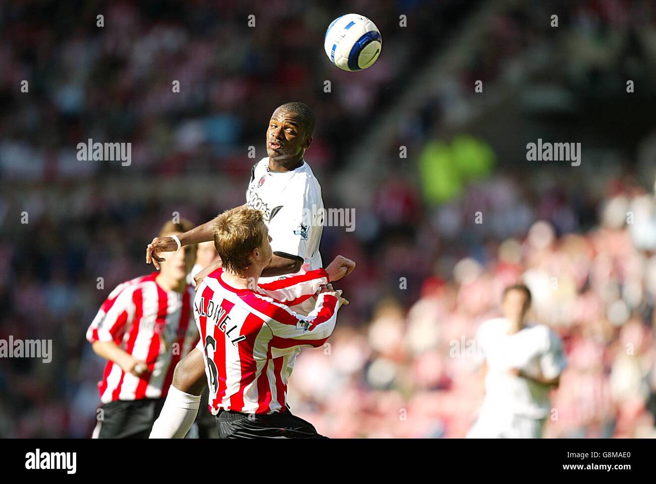 Charlton Athletic's Darren Bent wins the ball above Sunderland's Stephen Caldwell Stock Photo