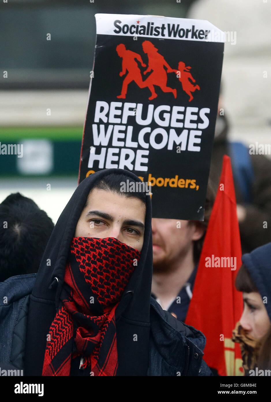 Anti-fascist protesters take part in a counter demonstration as far ...