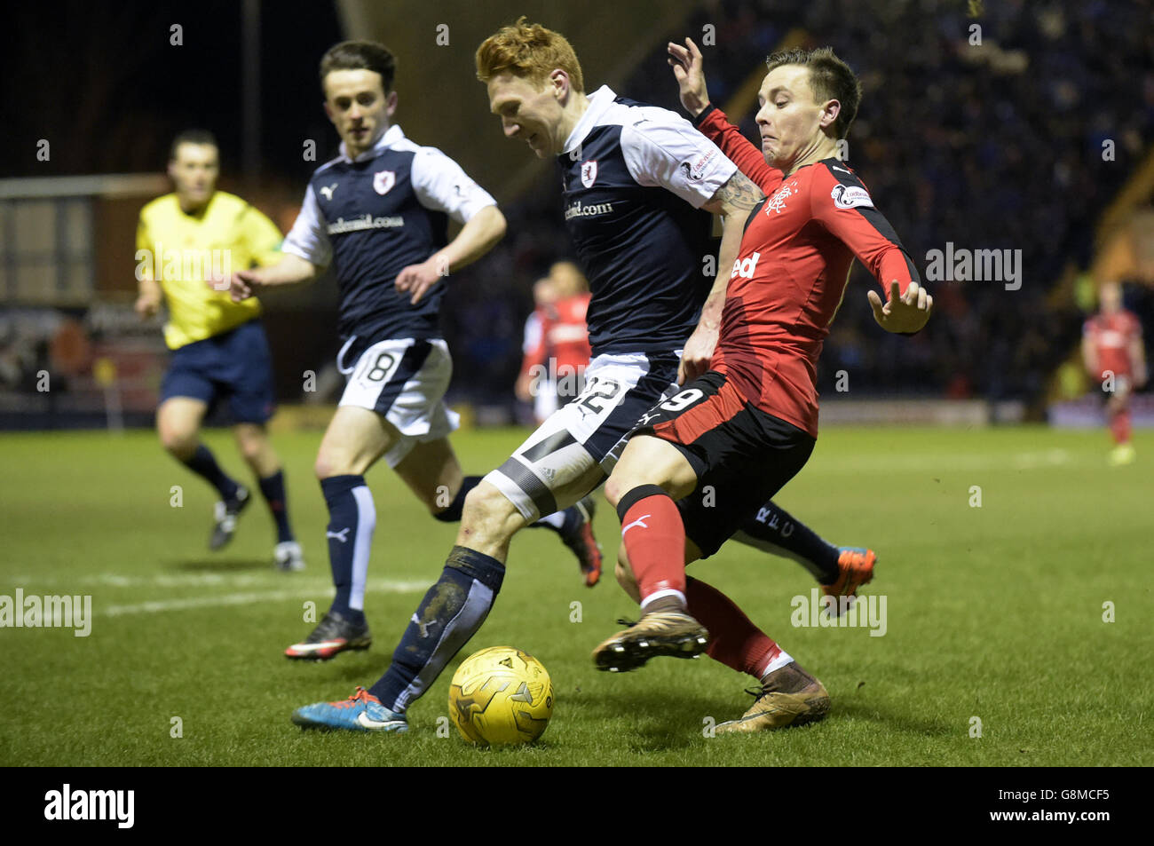 Raith Rovers' Rory McKeown and Rangers' Barry McKay (right) battle for the ball during the Ladbrokes Scottish Championship match at Stark's Park, Kirkcaldy. Stock Photo